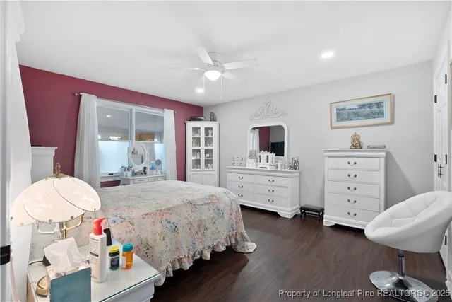 a bedroom with a bed and furniture