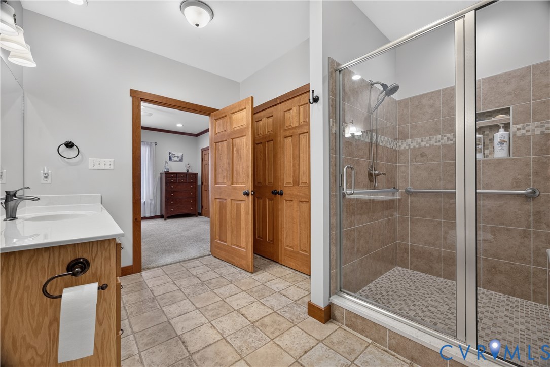 1292 Mohawk Road Long Island, VA 24569 - Photo 61 of 95 Walk-in shower with clear glass enclosure and ston