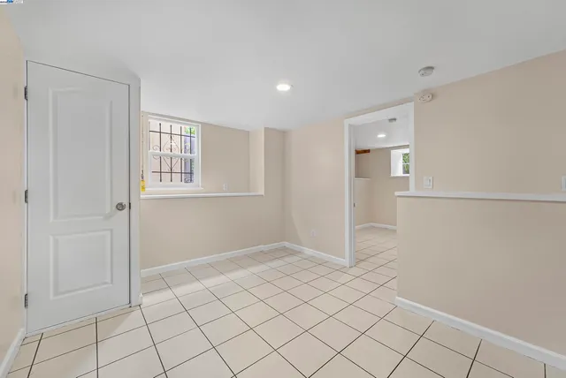 a view of kitchen with a refrigerator cabinets and a counter top space