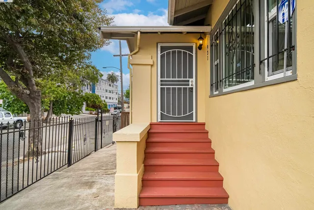 a front view of a house with a porch