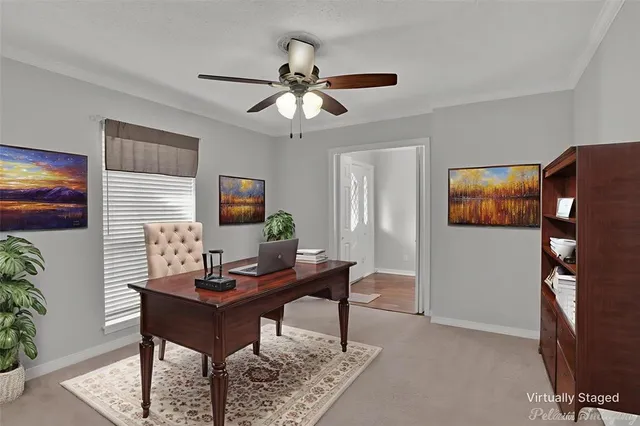 a view of a workspace with furniture