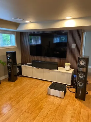 a living room with a couch and a flat screen tv
