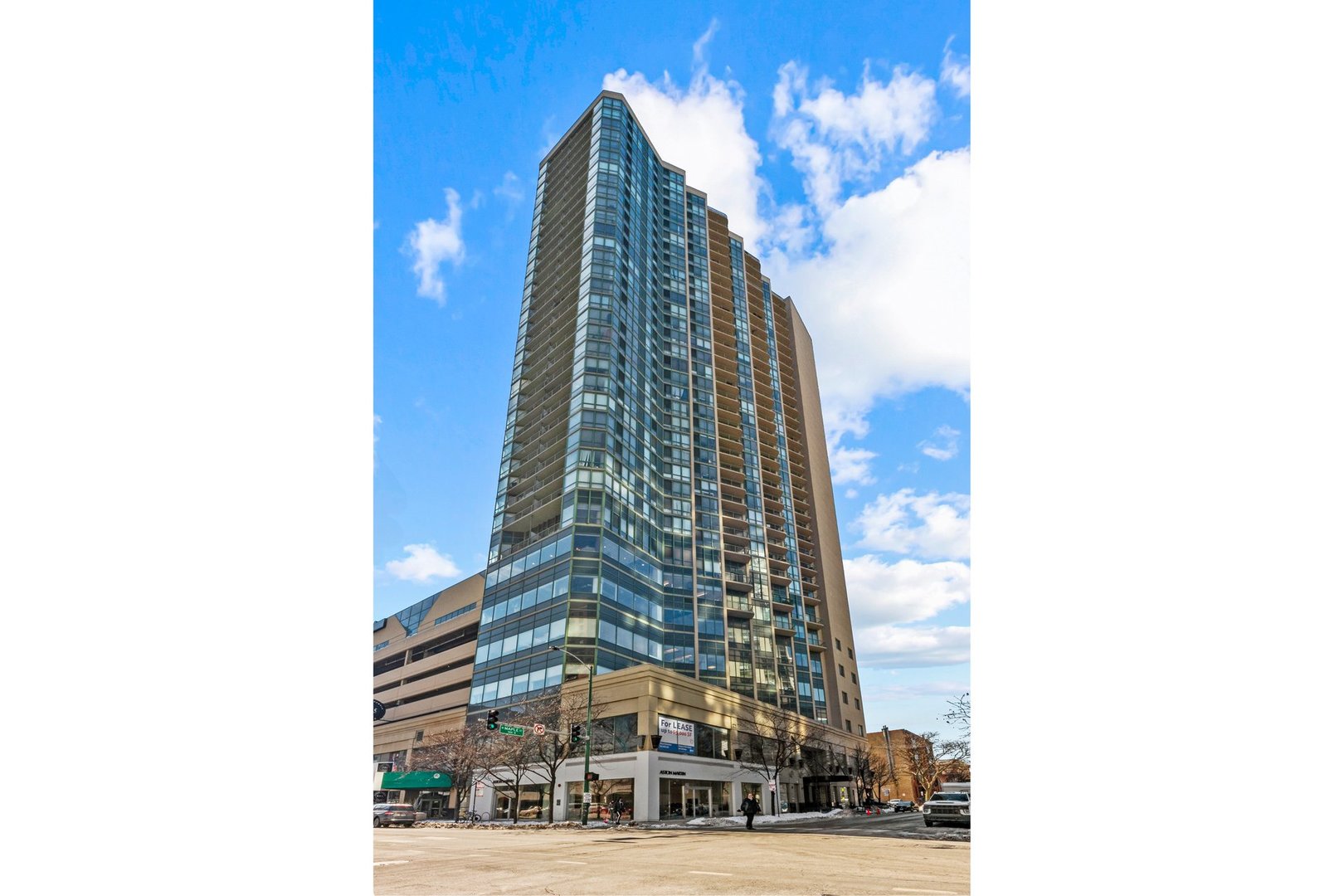 111 West Maple Street, Unit 1009 Chicago, IL 60610 - Photo 18 of 18 a view of a tall building