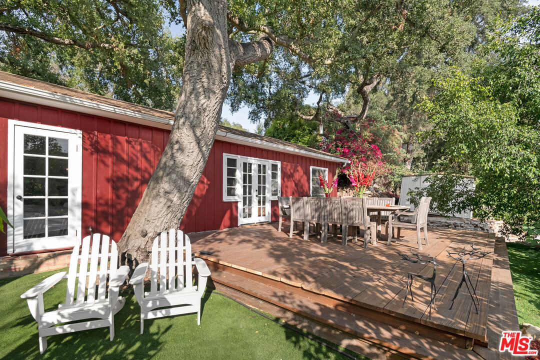 21042 Entrada Road Topanga, CA 90290 - Photo 1 of 49 a view of a house with backyard and sitting area