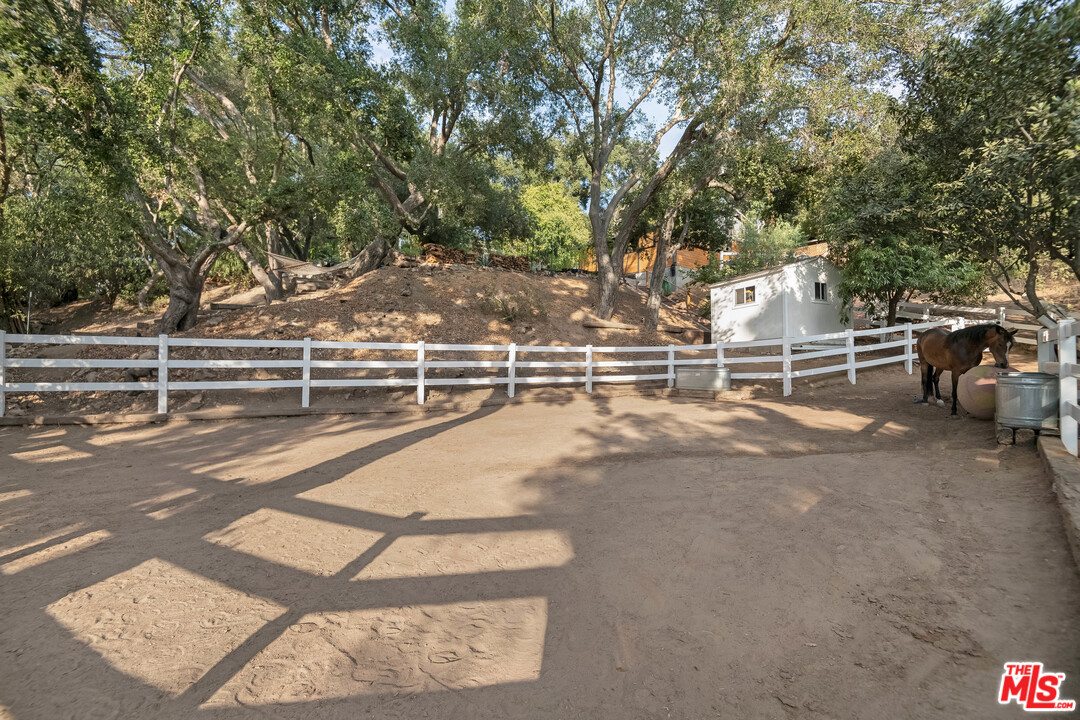 21042 Entrada Road Topanga, CA 90290 - Photo 16 of 49 a view of a tennis court