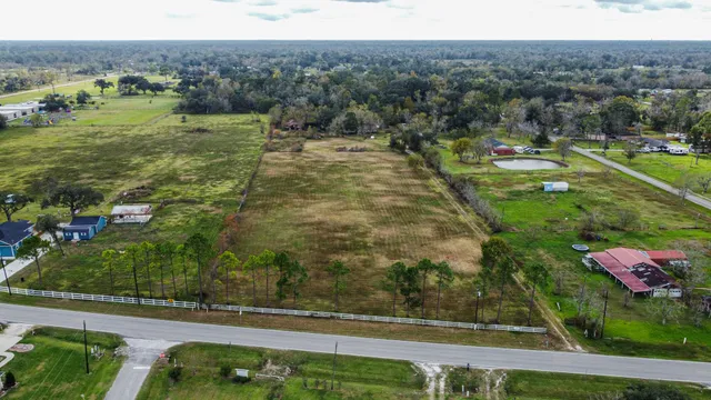 a view of a swimming pool with an outdoor seating