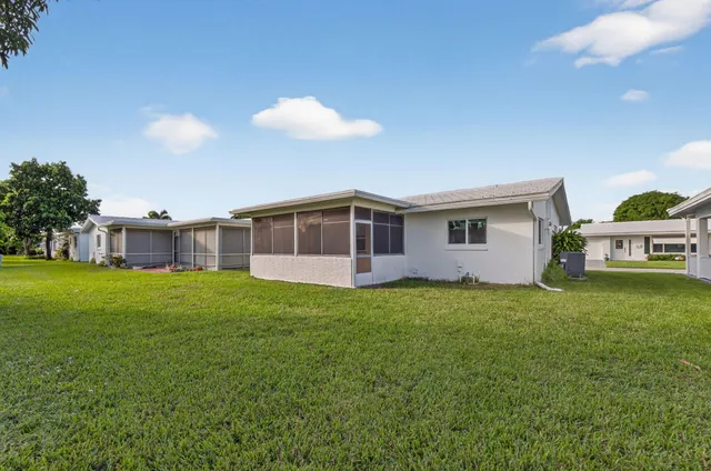 a house view with a garden space