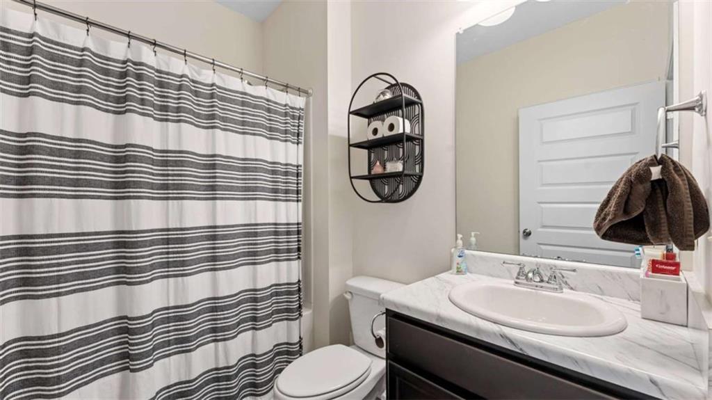 13 Oak View Drive Northeast Rome, GA 30165 - Photo 17 of 26 a bathroom with a sink toilet and shower