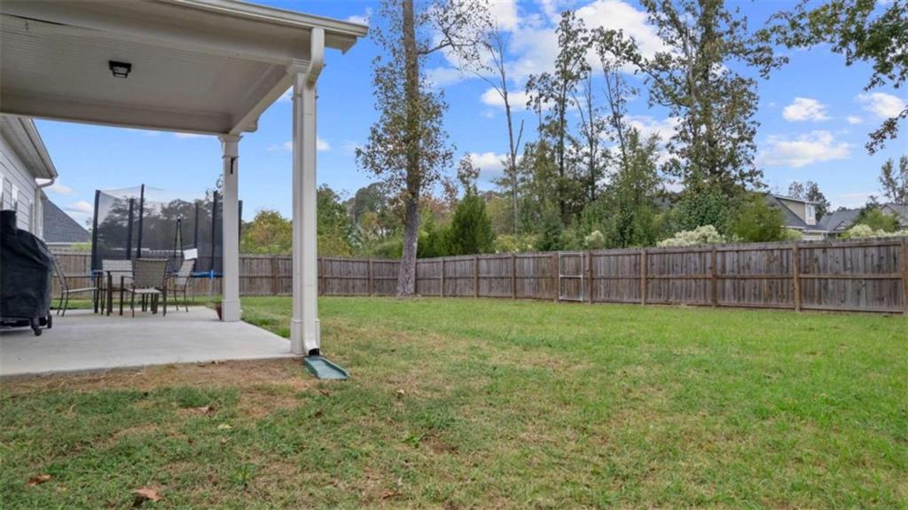 13 Oak View Drive Northeast Rome, GA 30165 - Photo 20 of 26 a view of a backyard with green space