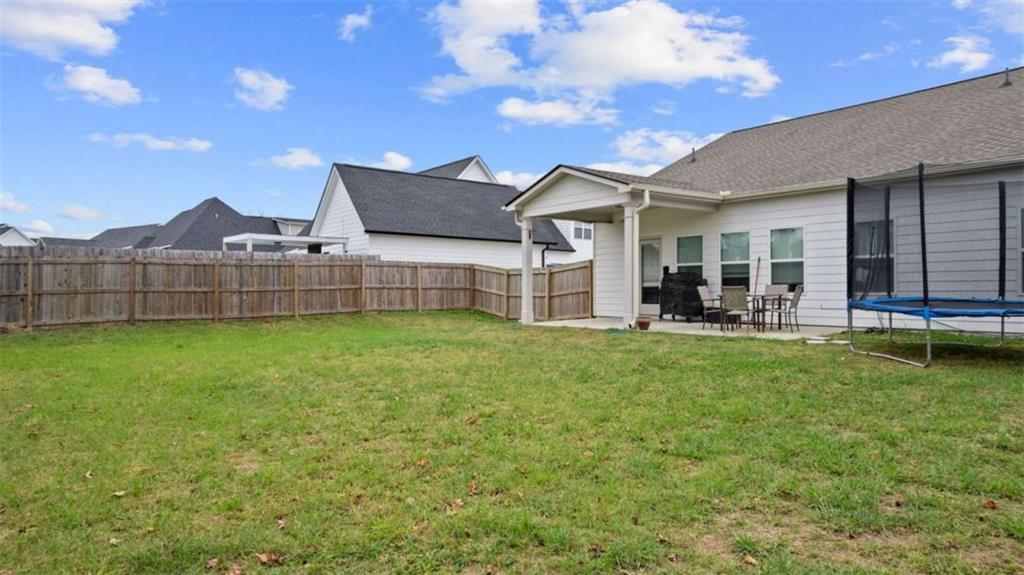 13 Oak View Drive Northeast Rome, GA 30165 - Photo 21 of 26 a front view of a house with a garden and yard