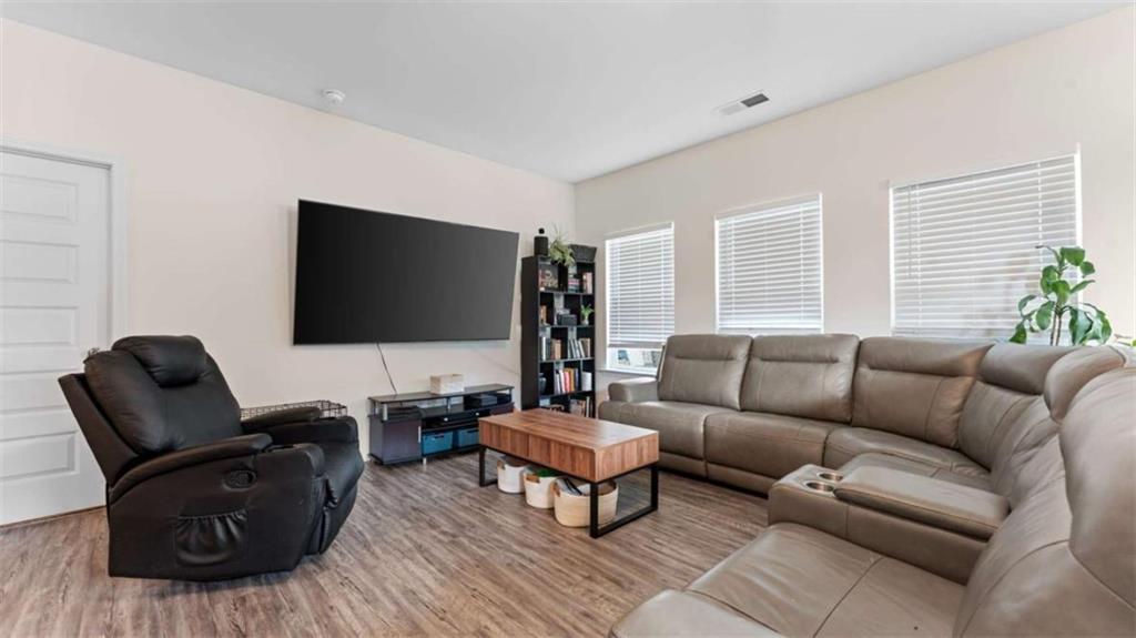 13 Oak View Drive Northeast Rome, GA 30165 - Photo 5 of 26 a living room with furniture and a flat screen tv