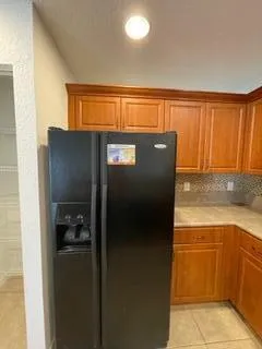 a close view of sink and cabinets