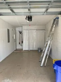 a view of a swimming pool and a yard