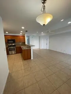a view of a hall with the kitchen