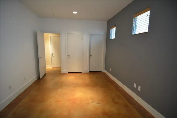 an empty room with windows