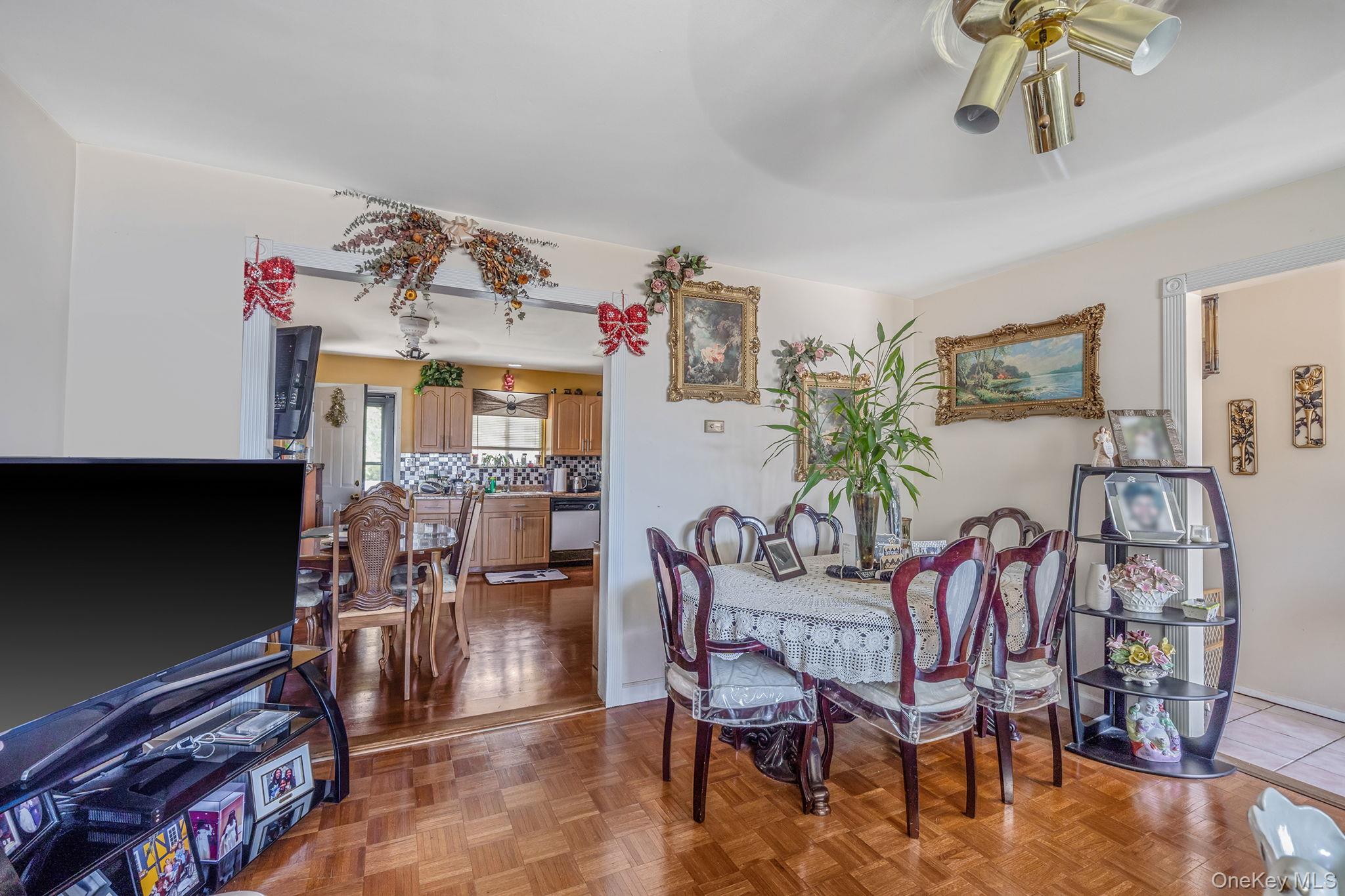 1169 Little E Neck Road West Babylon, NY 11704 - Photo 5 of 28 a view of a dining room with furniture