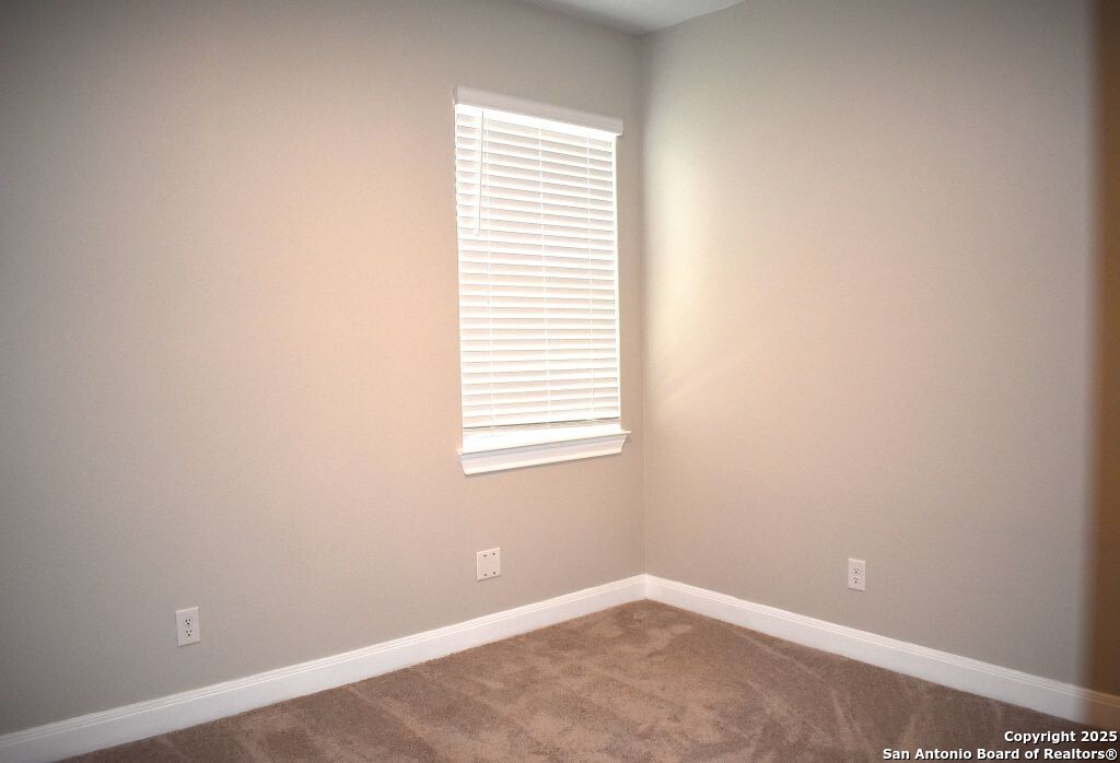 9210 Espadrille Run Converse, TX 78109 - Photo 9 of 17 an empty room with a window