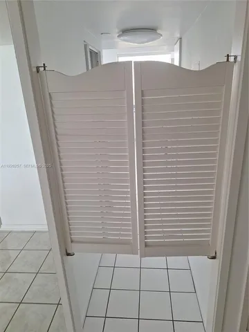 a view of a patio with chairs and tables