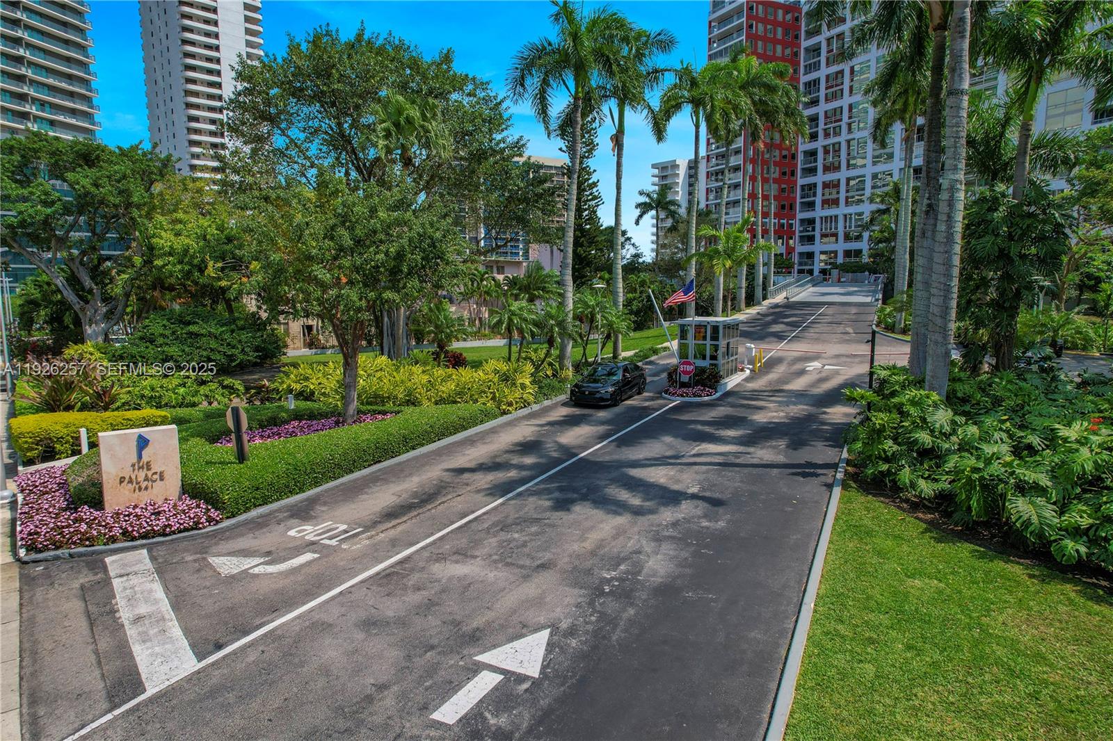 1541 Brickell Avenue, Unit A1201 Miami, FL 33129 - Photo 2 of 17 a front view of a house with a yard and potted plants