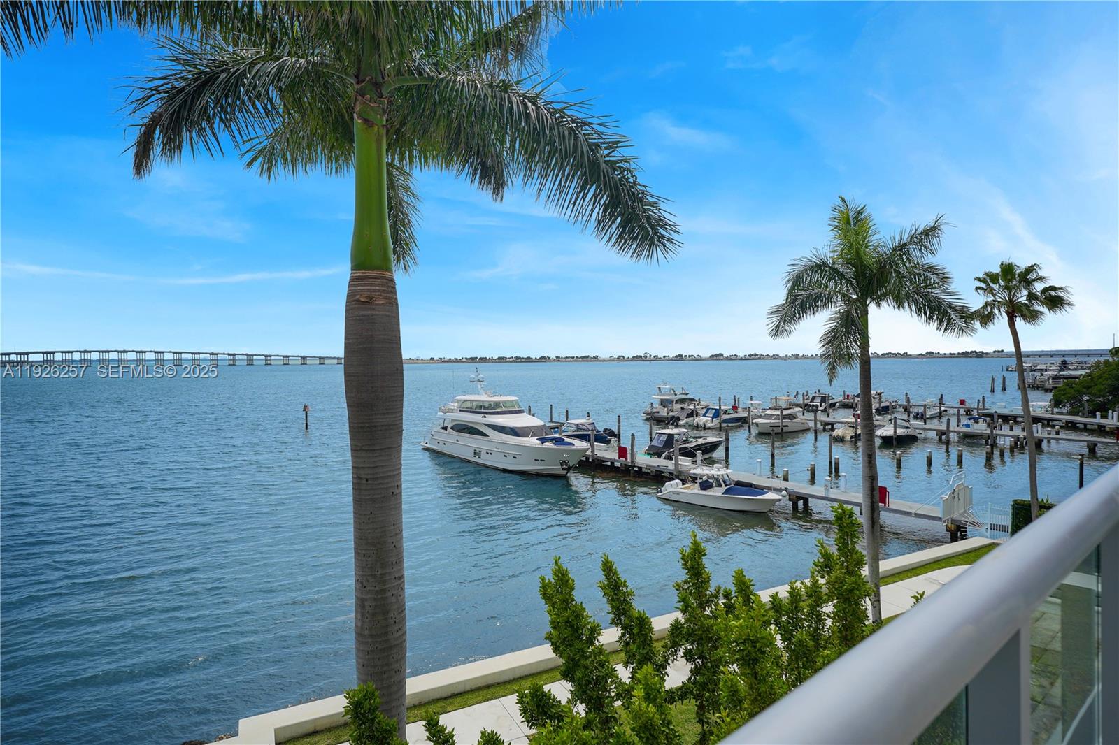 1541 Brickell Avenue, Unit A1201 Miami, FL 33129 - Photo 7 of 17 a view of ocean with boats and palm trees