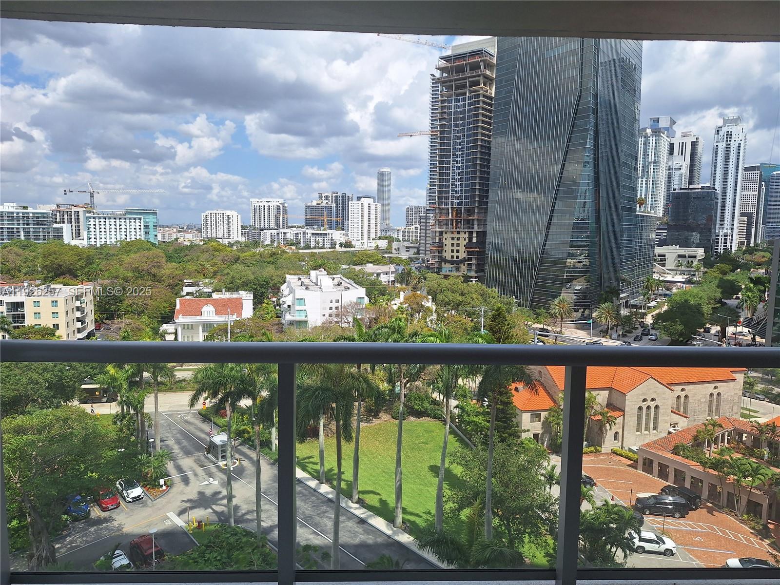 1541 Brickell Avenue, Unit A1201 Miami, FL 33129 - Photo 9 of 17 a city view from a balcony