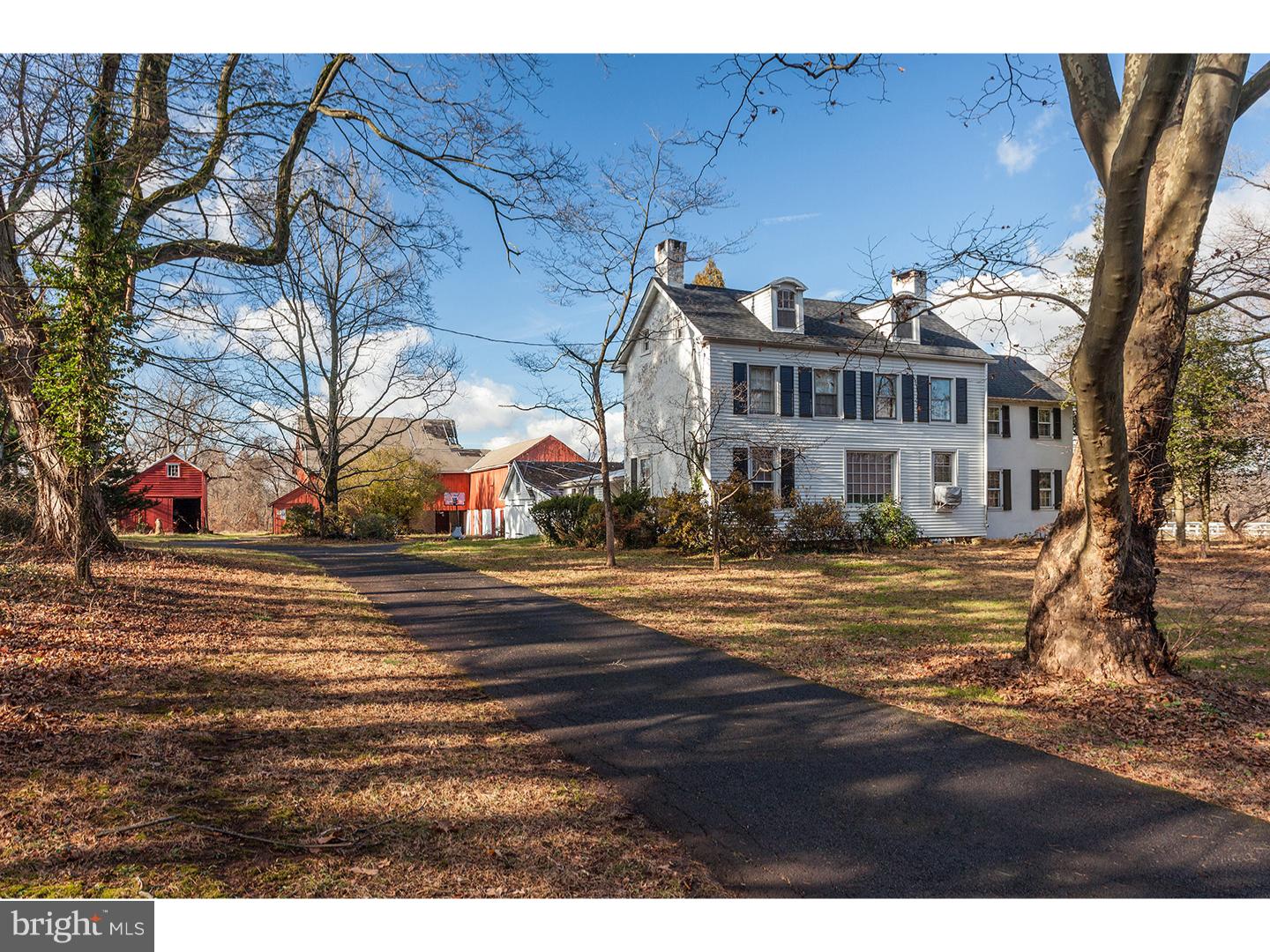 2963 Windy Bush Road Newtown, PA 18940 - Photo 1 of 16 a front view of a house with a yard