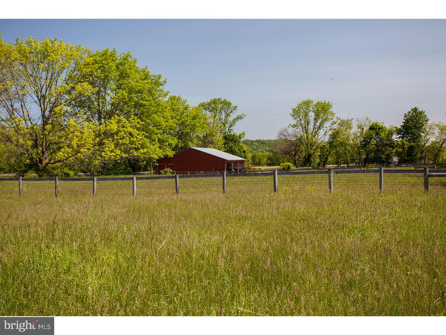 2963 Windy Bush Road Newtown, PA 18940 - Photo 7 of 16 a backyard of a house with lots of green space