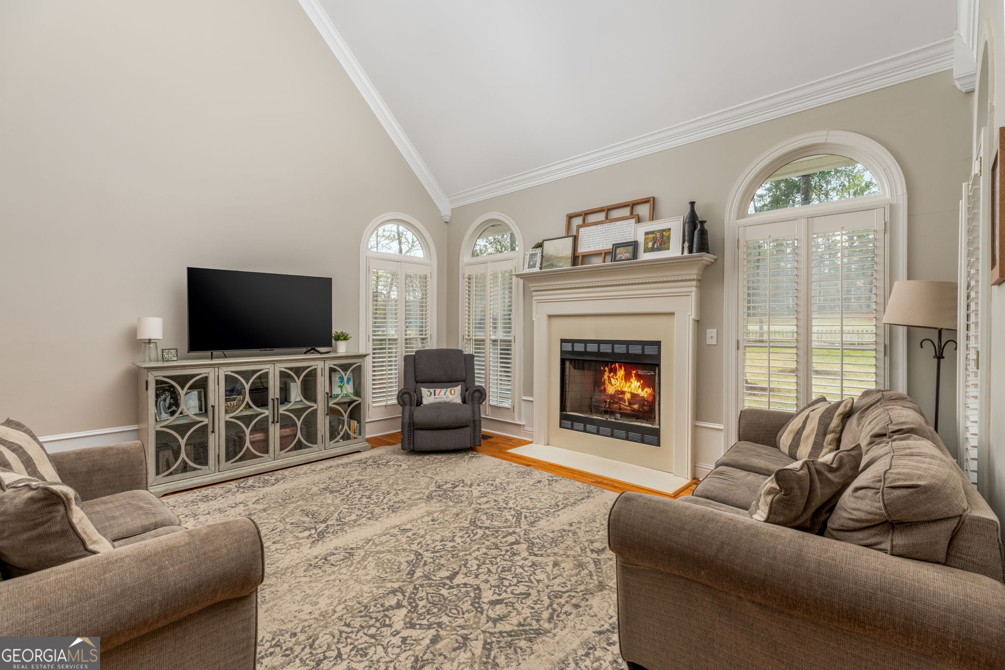 144 Cambridge Way Macon, GA 31220 - Photo 11 of 50 a living room with furniture and a flat screen tv