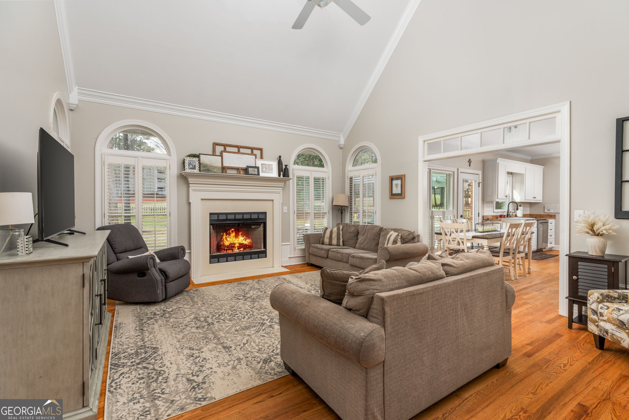 144 Cambridge Way Macon, GA 31220 - Photo 12 of 50 a living room with furniture and a fireplace
