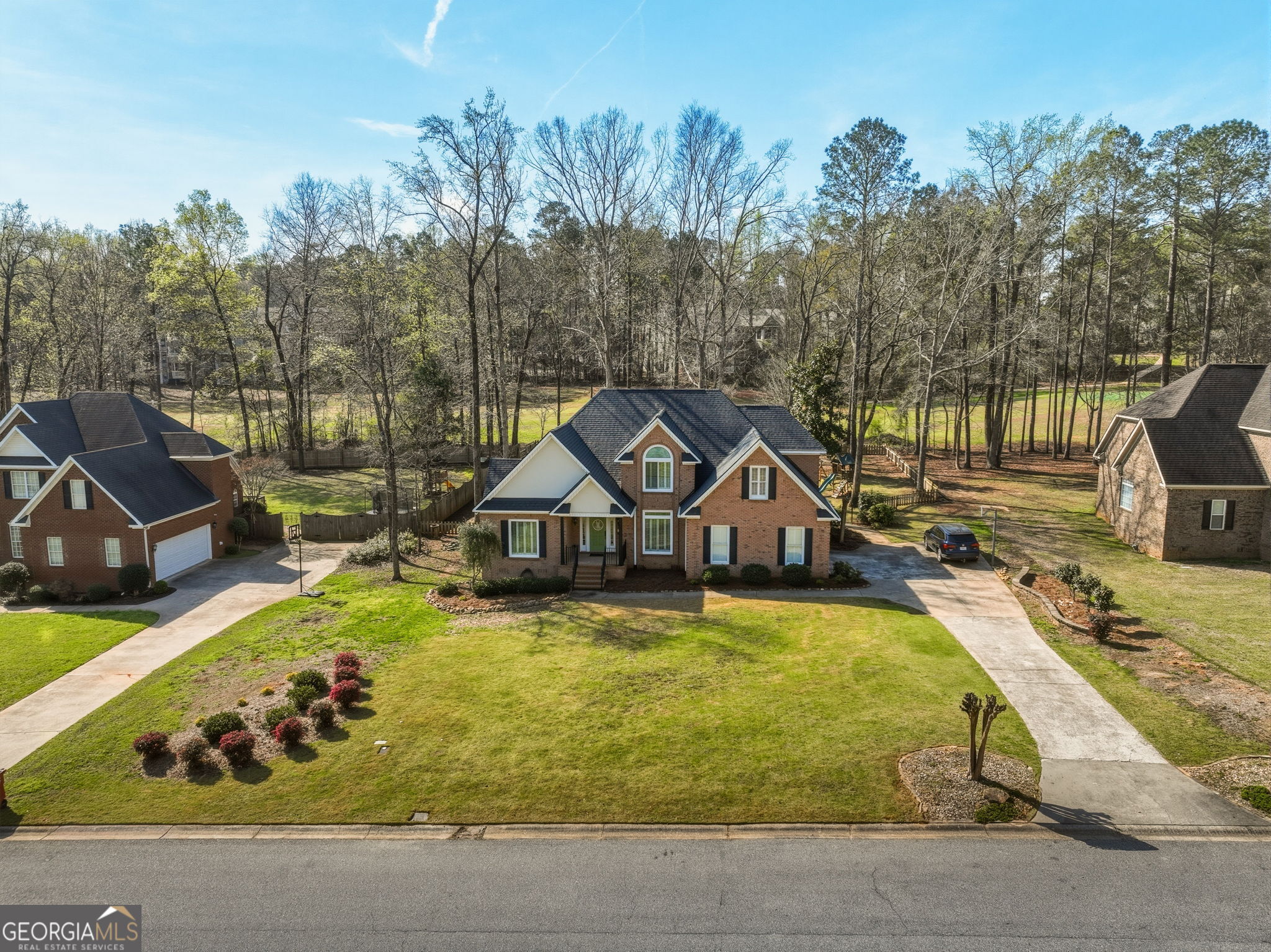 144 Cambridge Way Macon, GA 31220 - Photo 2 of 50 a view of a swimming pool with a patio