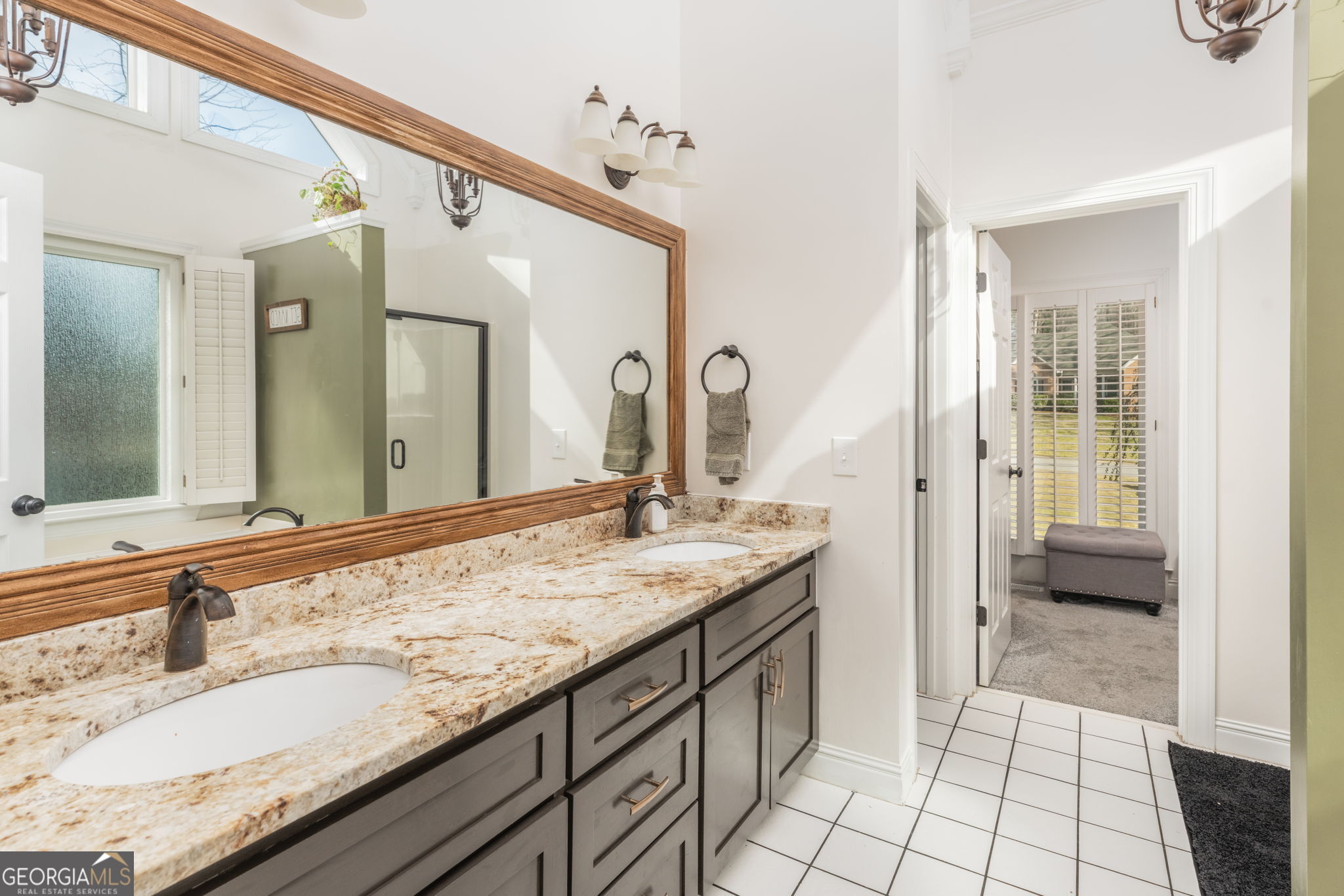 144 Cambridge Way Macon, GA 31220 - Photo 27 of 50 a bathroom with a granite countertop sink and a mirror