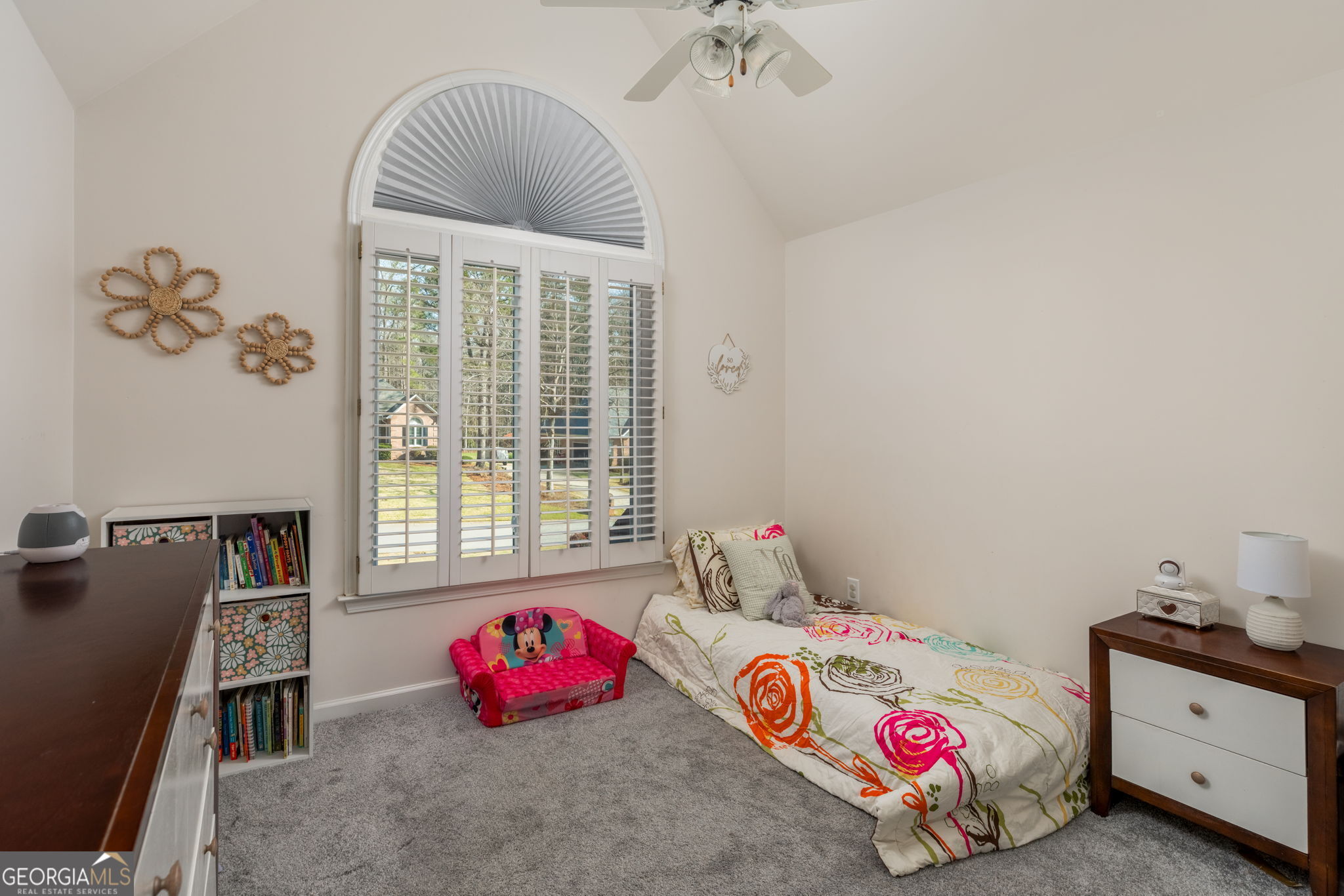 144 Cambridge Way Macon, GA 31220 - Photo 30 of 50 a bedroom with a bed and a chandelier
