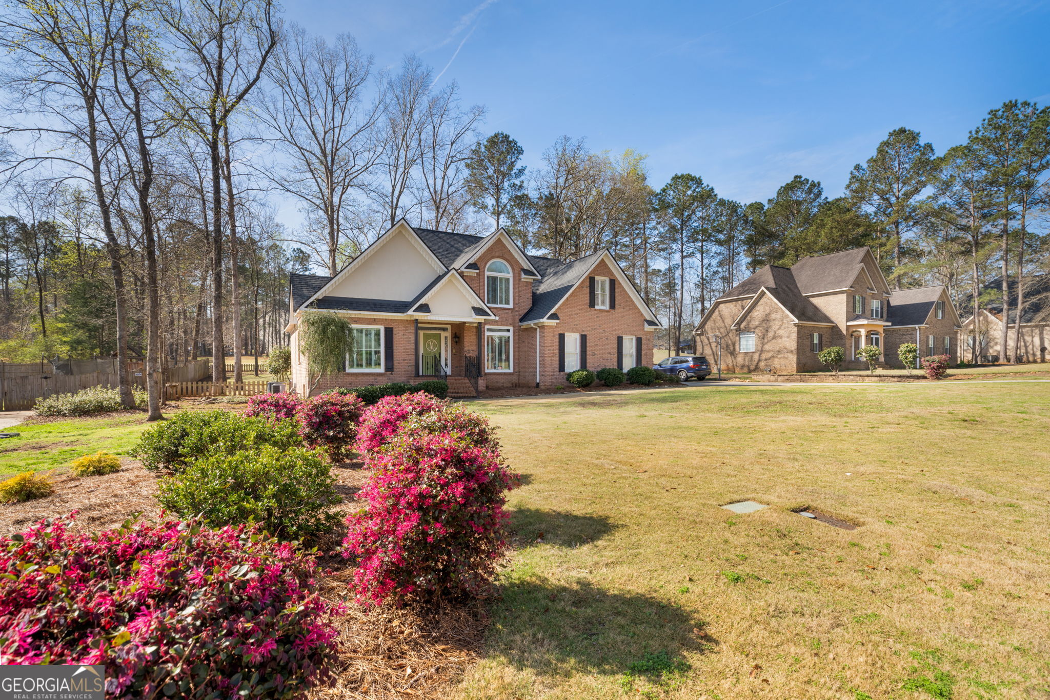 144 Cambridge Way Macon, GA 31220 - Photo 3 of 50 a front view of house with yard and swimming pool