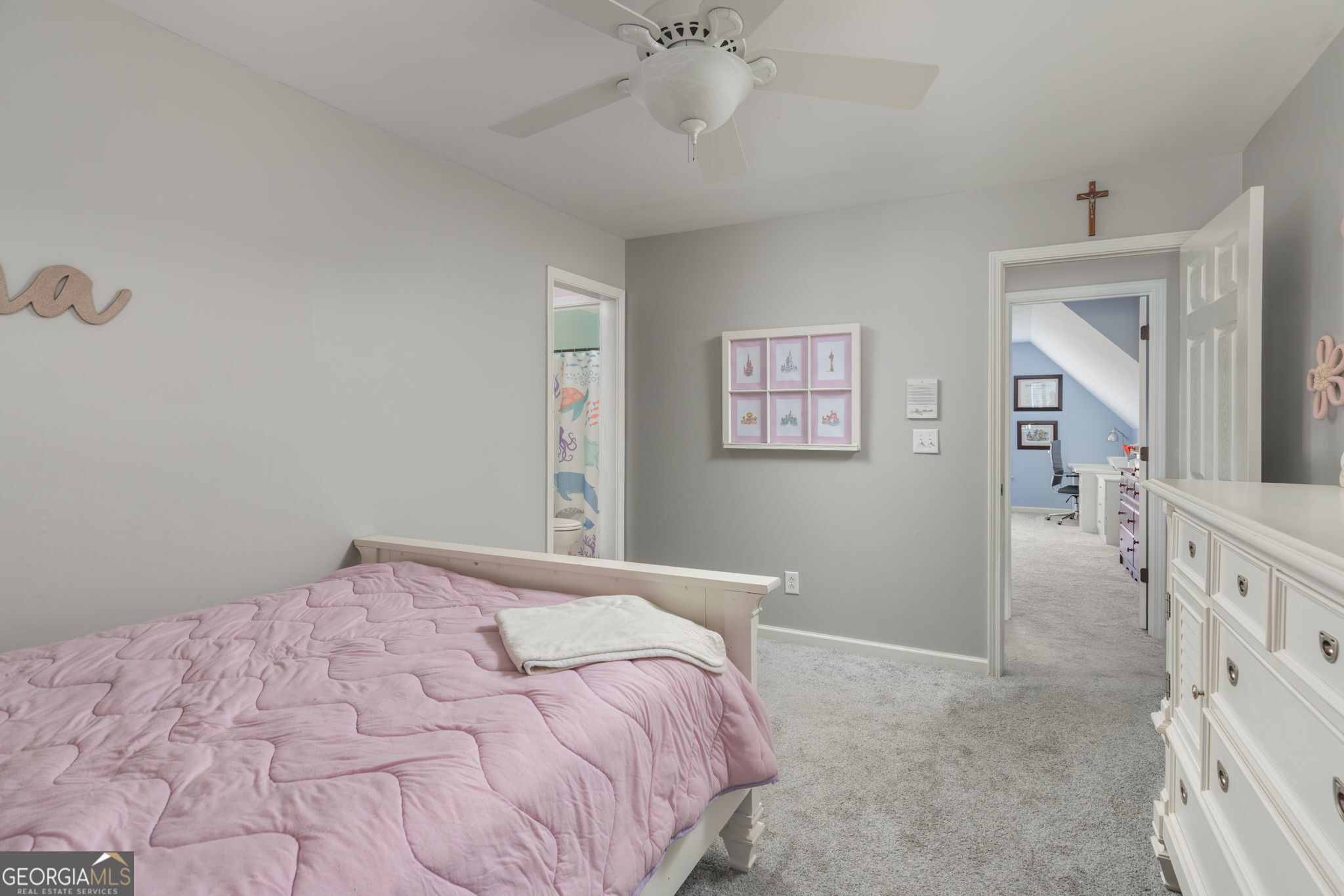 144 Cambridge Way Macon, GA 31220 - Photo 36 of 50 a bedroom with a bed and a chandelier