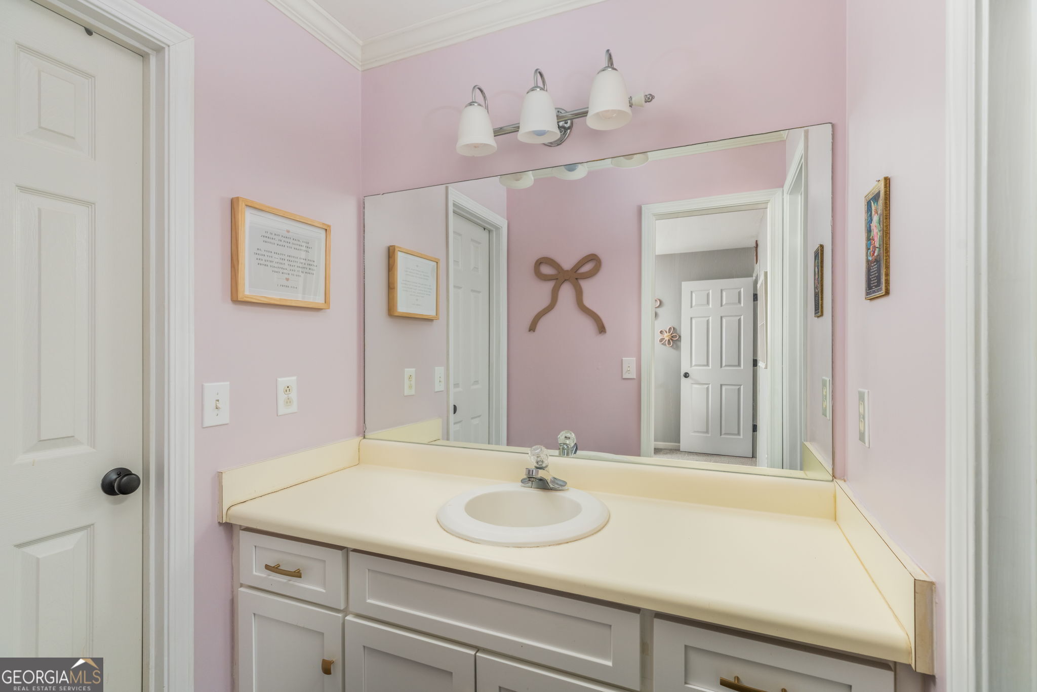 144 Cambridge Way Macon, GA 31220 - Photo 37 of 50 a bathroom with a sink and a mirror