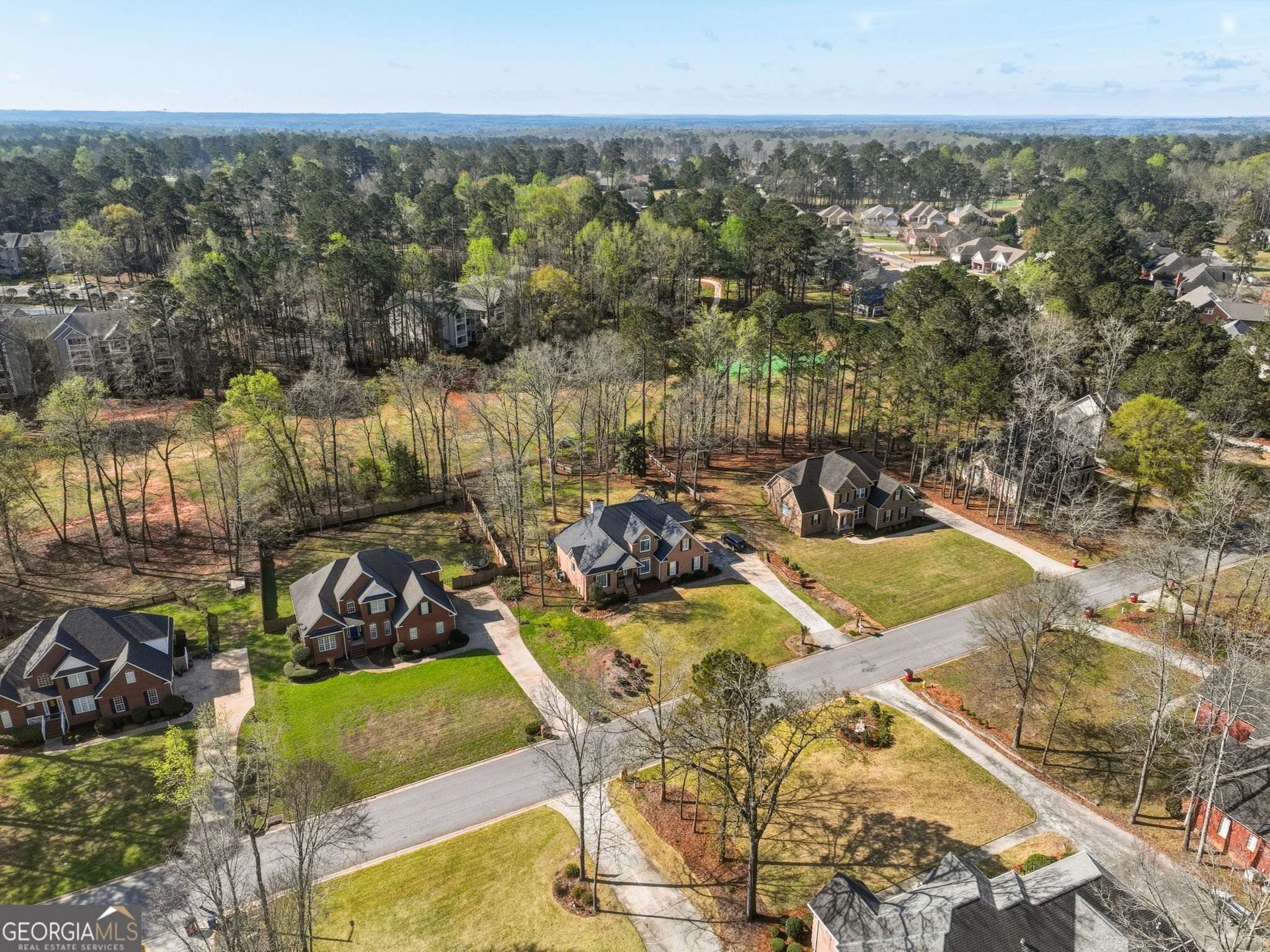 144 Cambridge Way Macon, GA 31220 - Photo 6 of 50 a view of a swimming pool with a patio