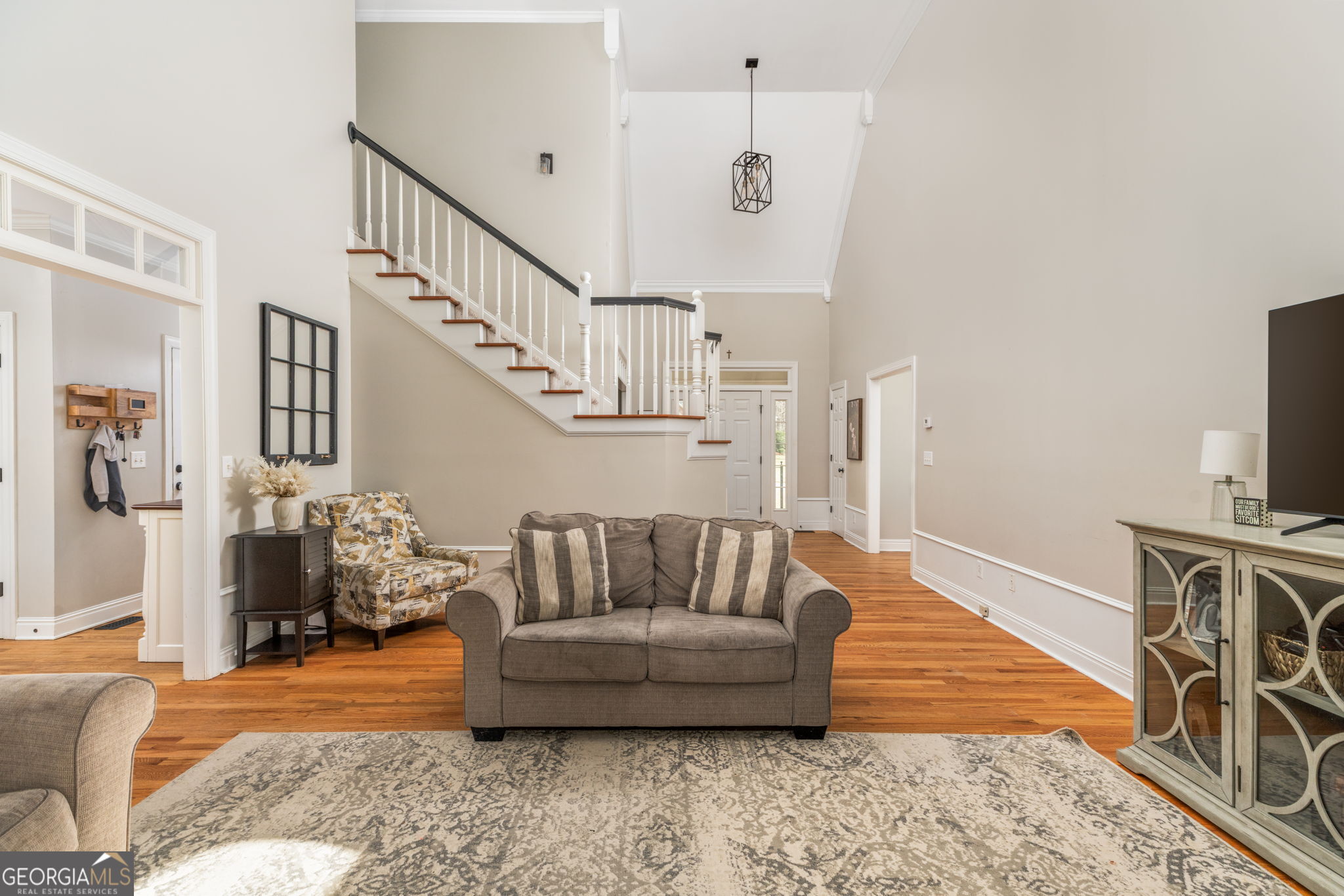 144 Cambridge Way Macon, GA 31220 - Photo 9 of 50 a living room with furniture and a flat screen tv