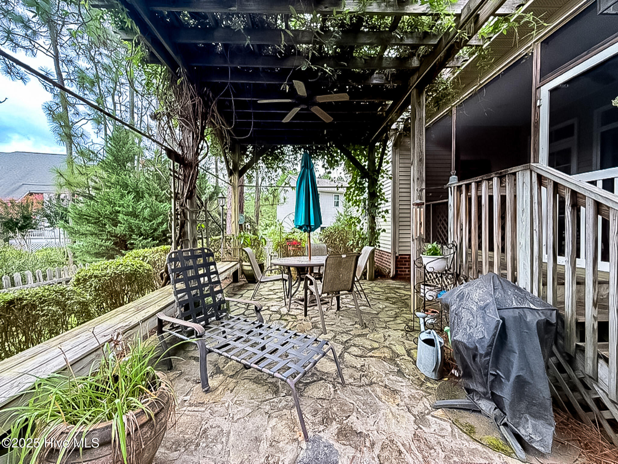 2 Troy Court Pinehurst, NC 28374 - Photo 13 of 71 Fenced in Section of the yard with Pergola that connects to the Screened Porch