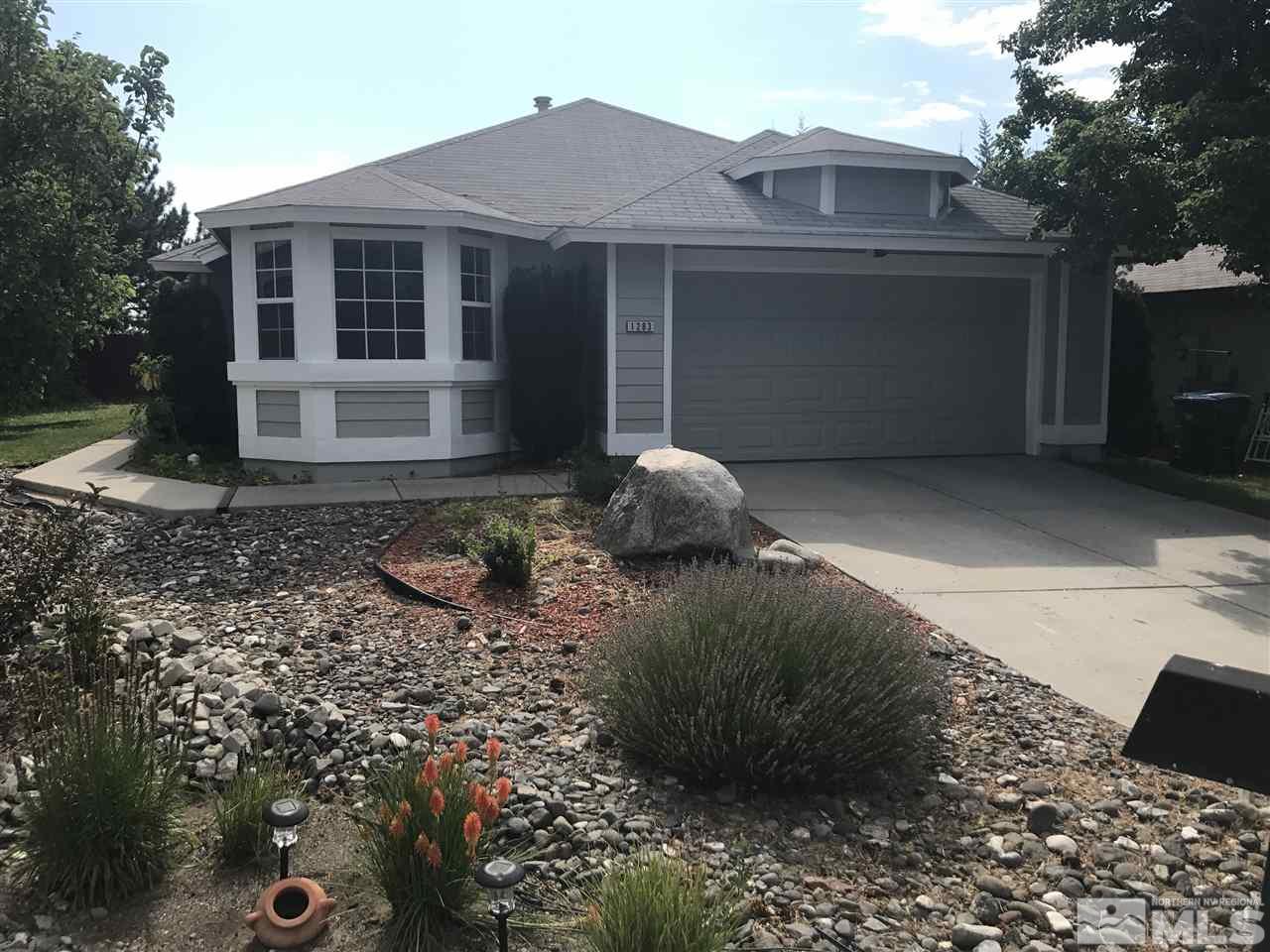 1283 Starview Circle, Unit STARVIEW /CIRCLE Reno, NV 89523 - Photo 1 of 1 a front view of a house with garden