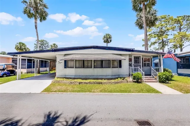 a view of a house with a swimming pool