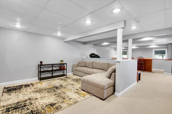 a living room with furniture and a table