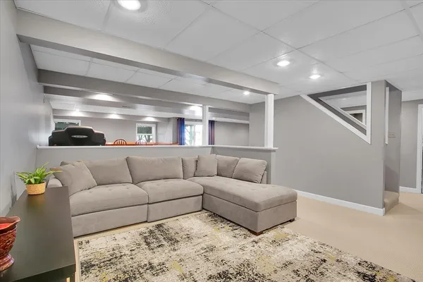 a living room with furniture and a couch