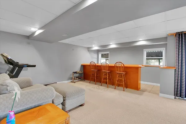 a bed room with furniture and a couch