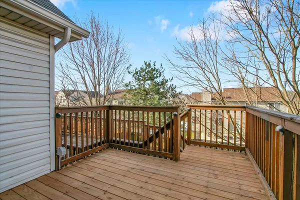 a view of deck with wooden floor and fence and floor