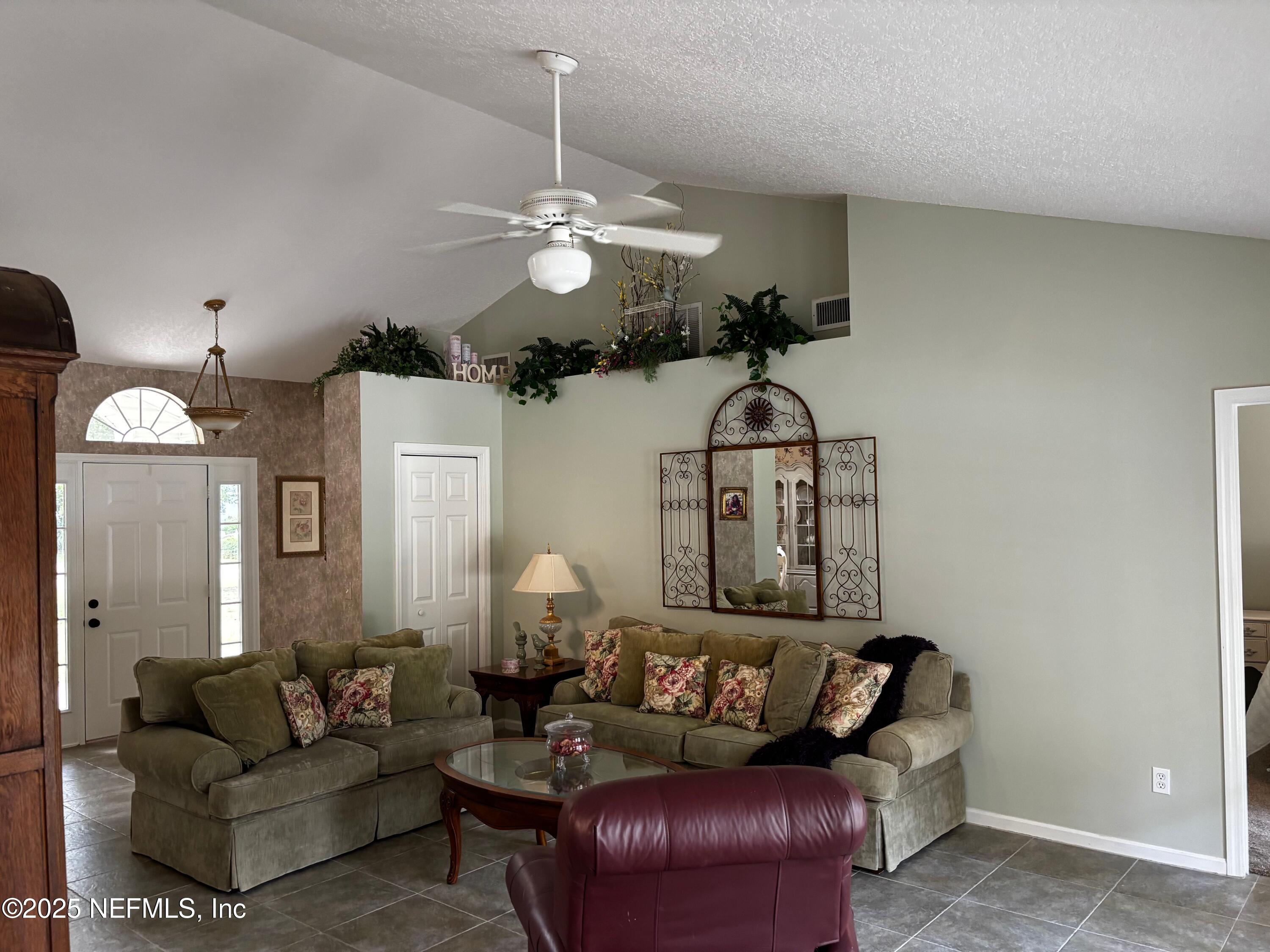 6121 Michele Road Macclenny, FL 32063 - Photo 8 of 26 a living room with furniture