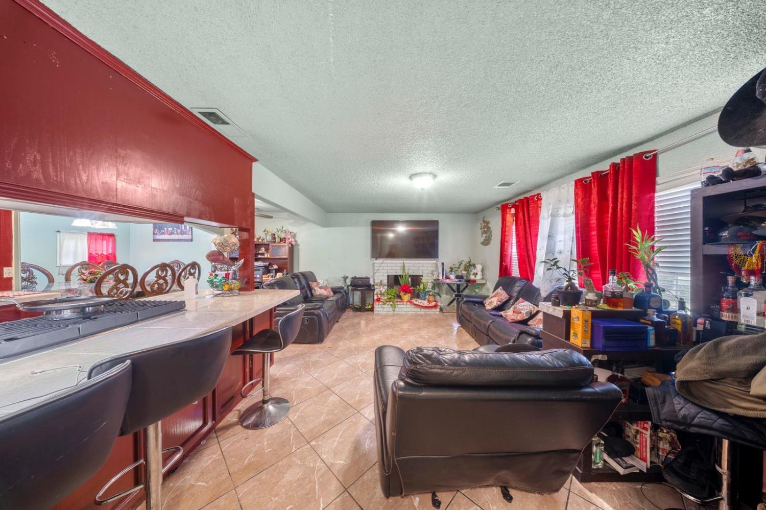 3140 Kellogg Avenue Turlock, CA 95382 - Photo 10 of 22 a living room with furniture and a fireplace