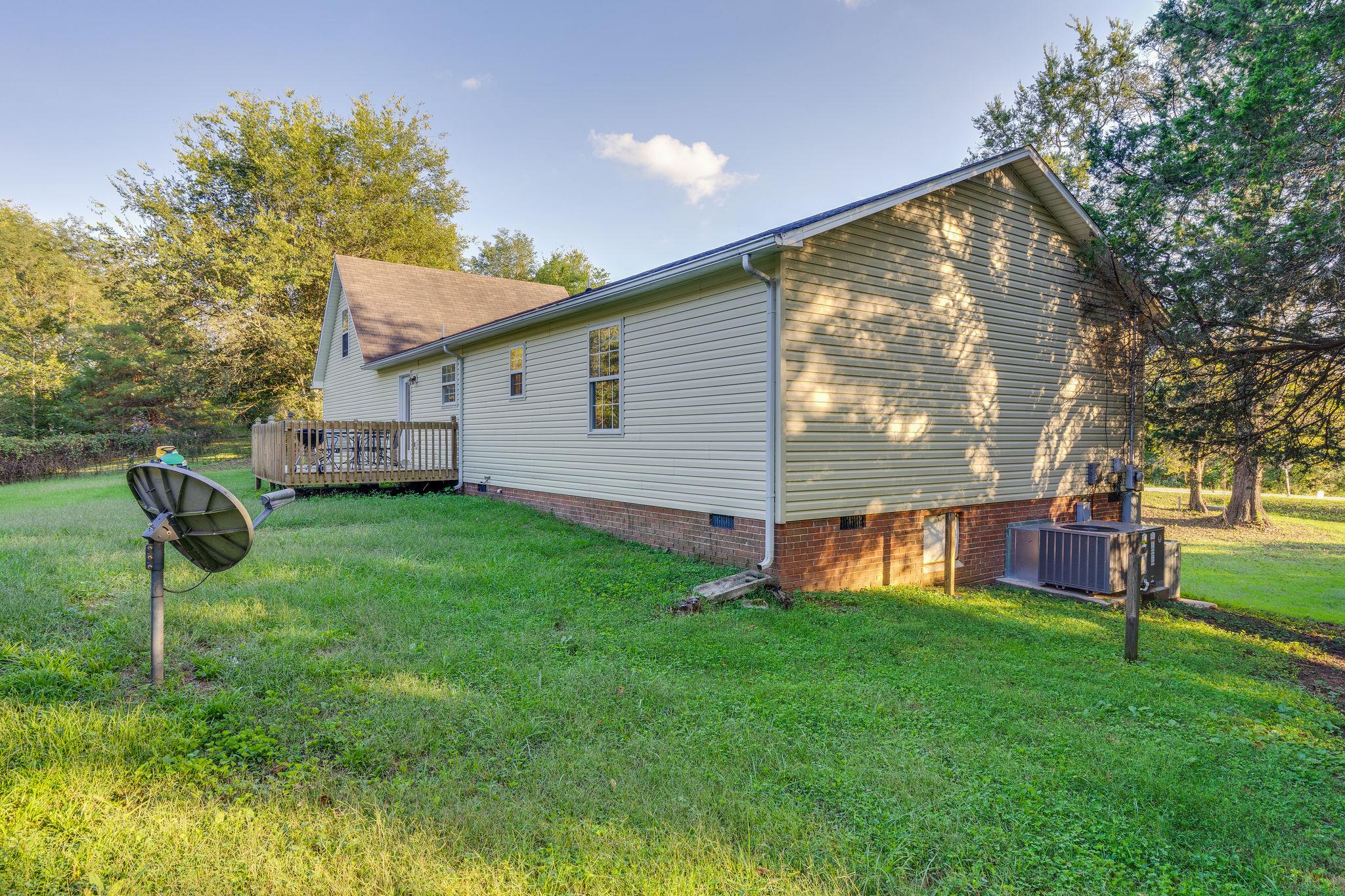 1253 Iron Bridge Road Columbia, TN 38401 - Photo 6 of 24 a backyard of a house with seating space