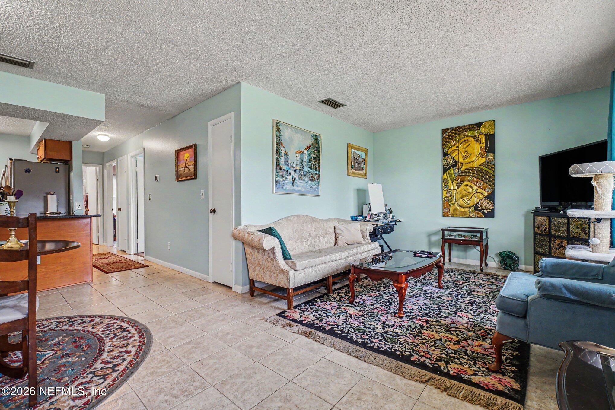 126 Rio Del Mar Street, Unit C St. Augustine, FL 32080 - Photo 3 of 10 005_file_3475