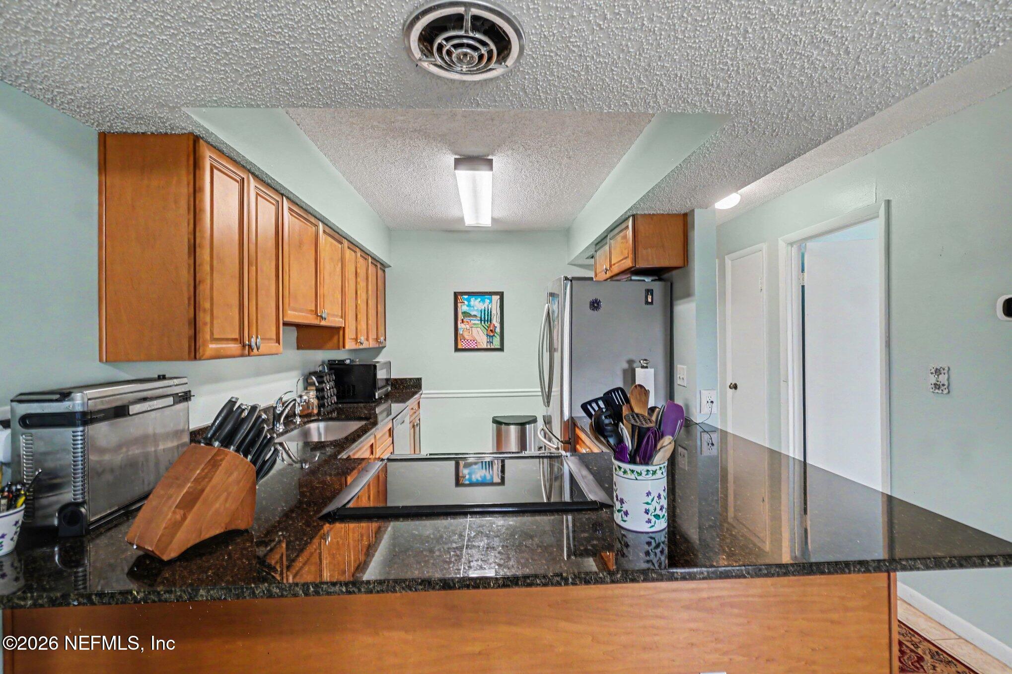 126 Rio Del Mar Street, Unit C St. Augustine, FL 32080 - Photo 5 of 10 011_file_7134