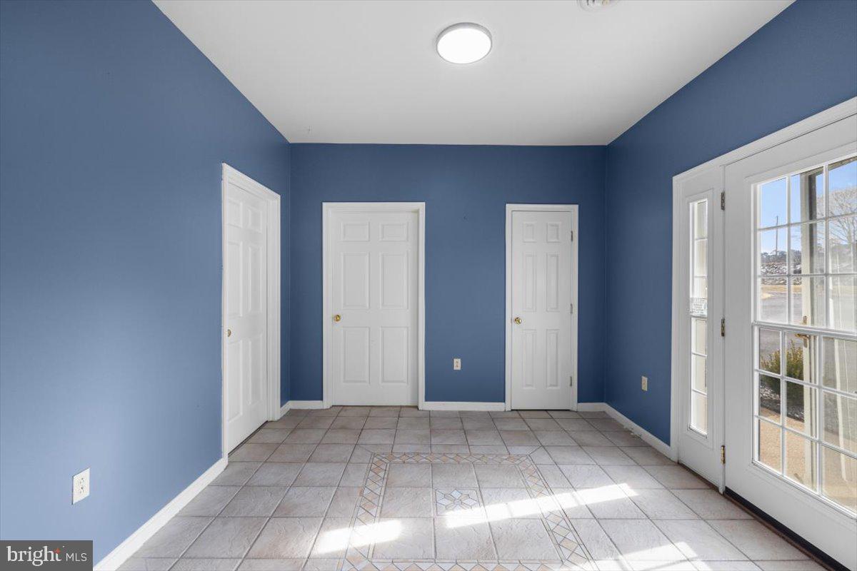 2370 Highway 211 Luray, VA 22835 - Photo 21 of 68 a view of an empty room with glass door